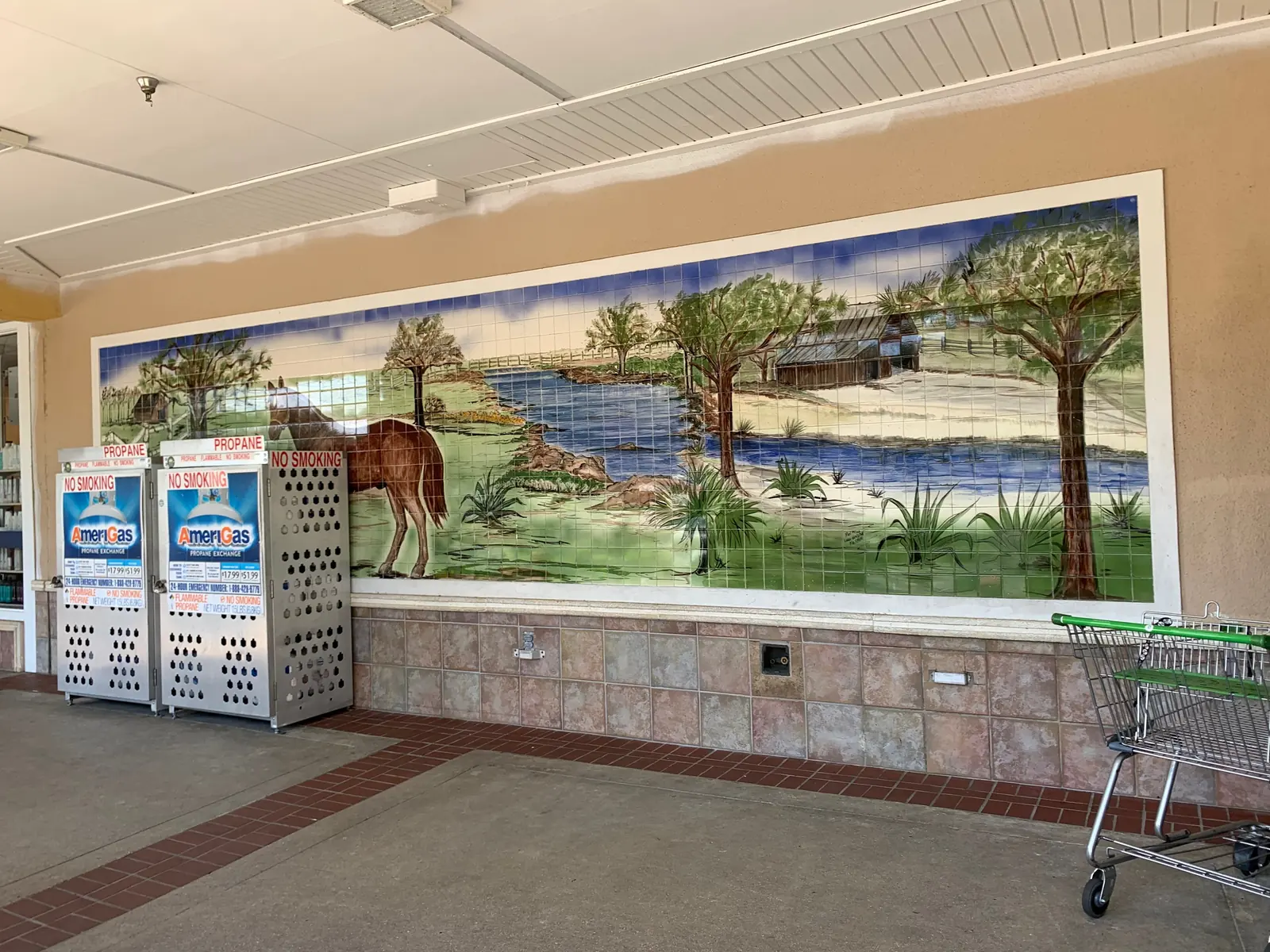A tile mural of an old Florida landscape at the entrance of a Publix supermarket in Davie.