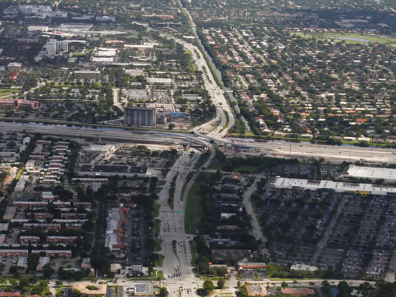 University Drive crosses I-595, the line between Davie in the foreground and Plantation beyond, in this aerial view.