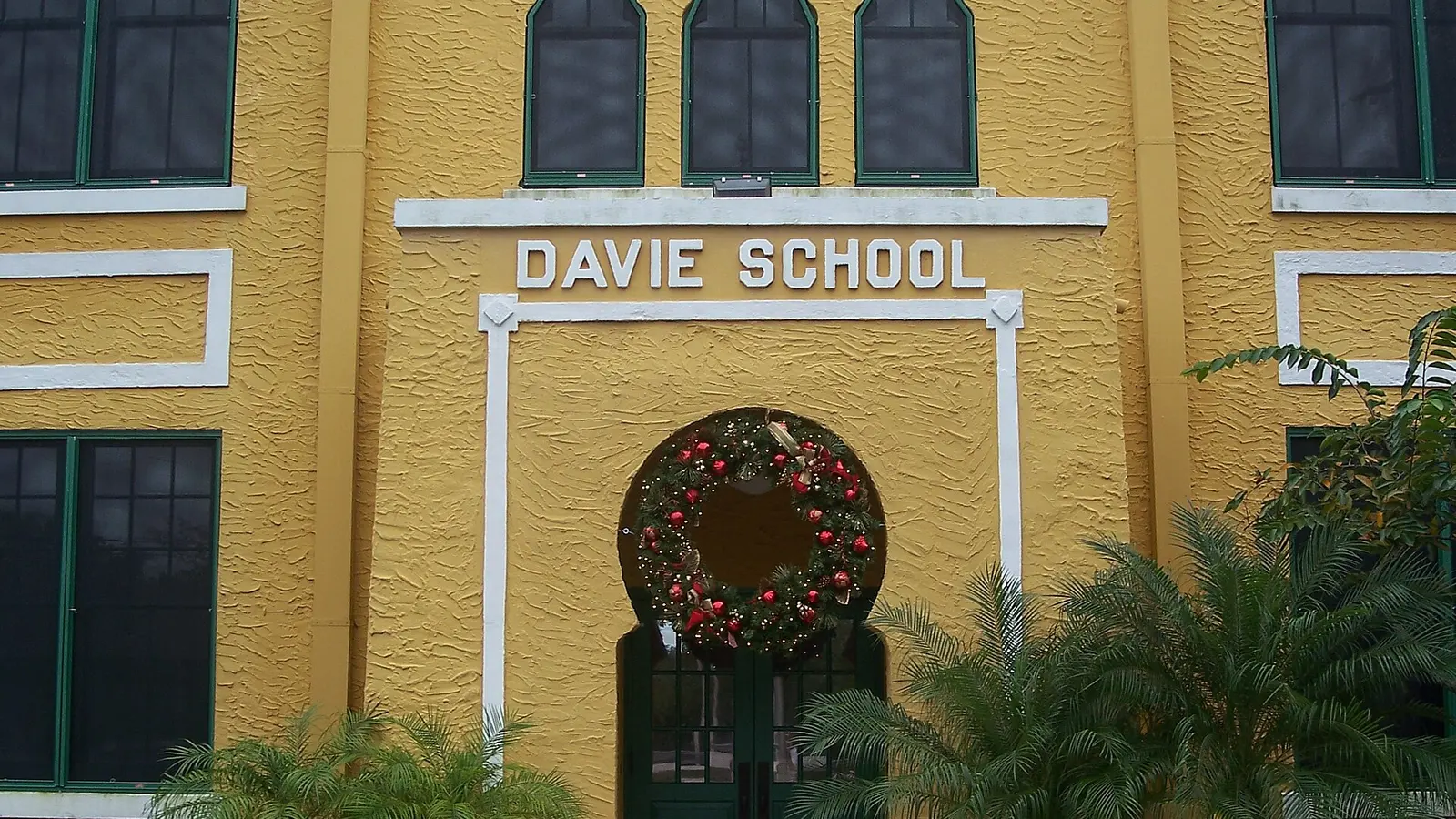 A holiday wreath on the entrance of the Old Davie School in downtown Davie.