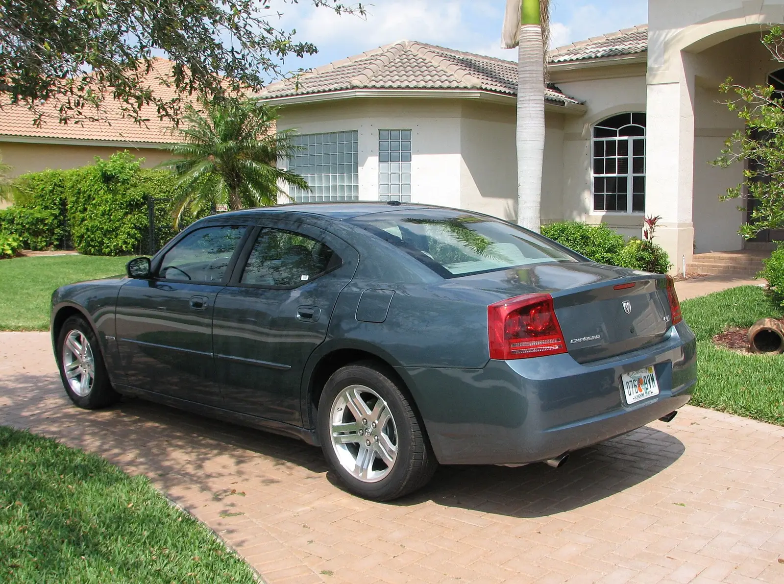 A house and driveway on a residential street in Davie.